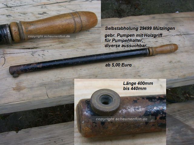 schwarze-metall-luftpumpen-mit-holzgriff